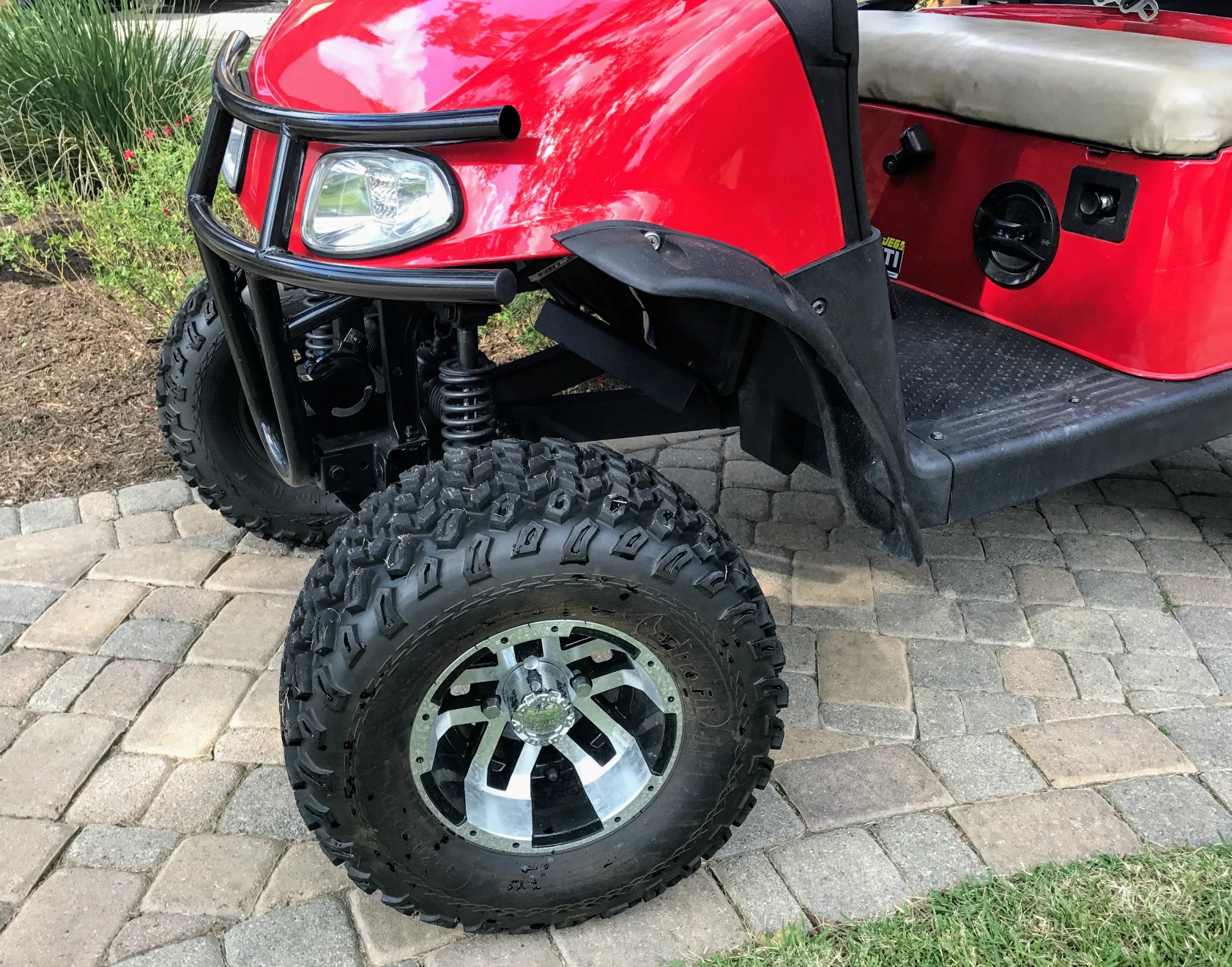 red lifted golf cart ego