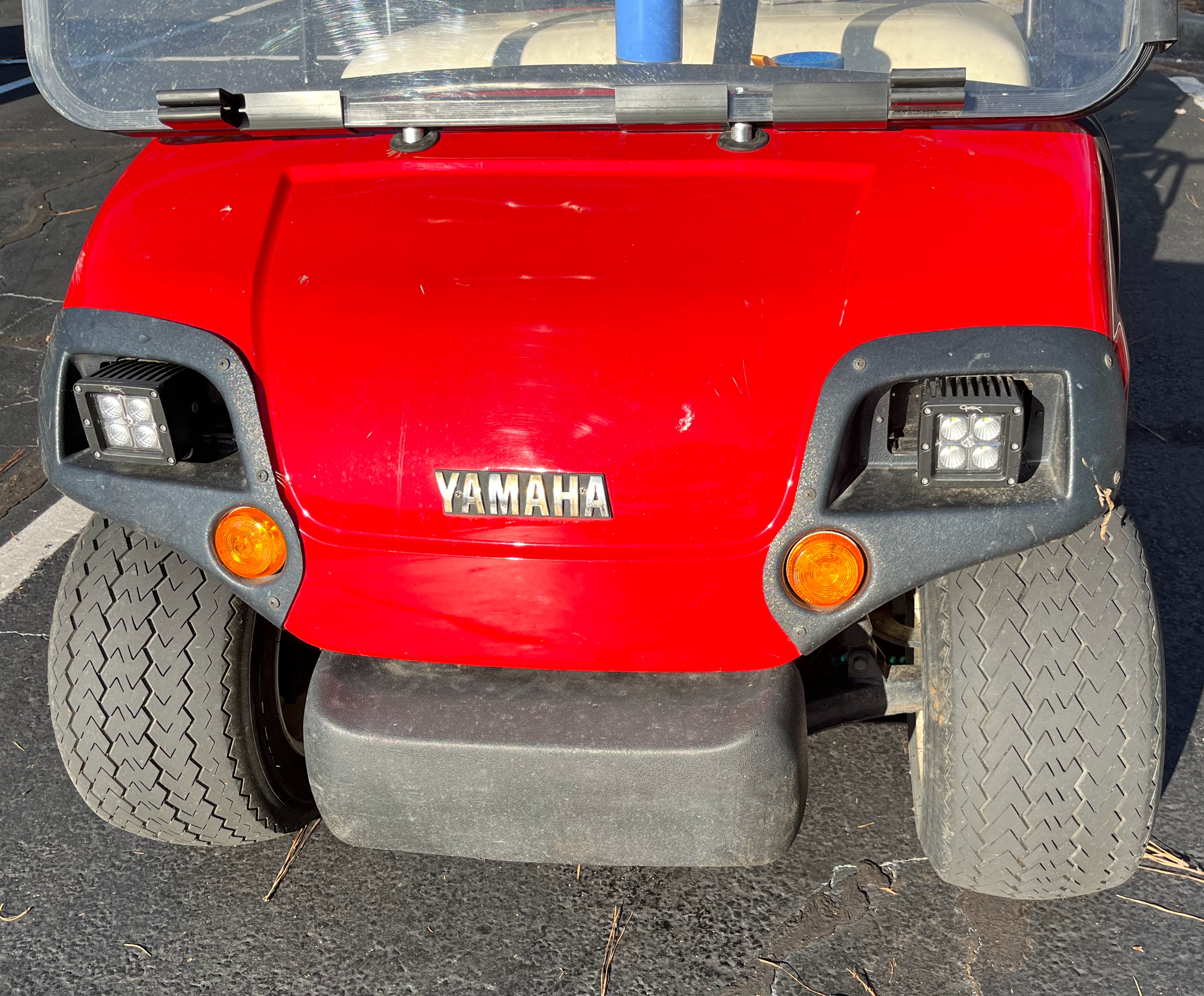 older red Yamaha golf cart front cowl