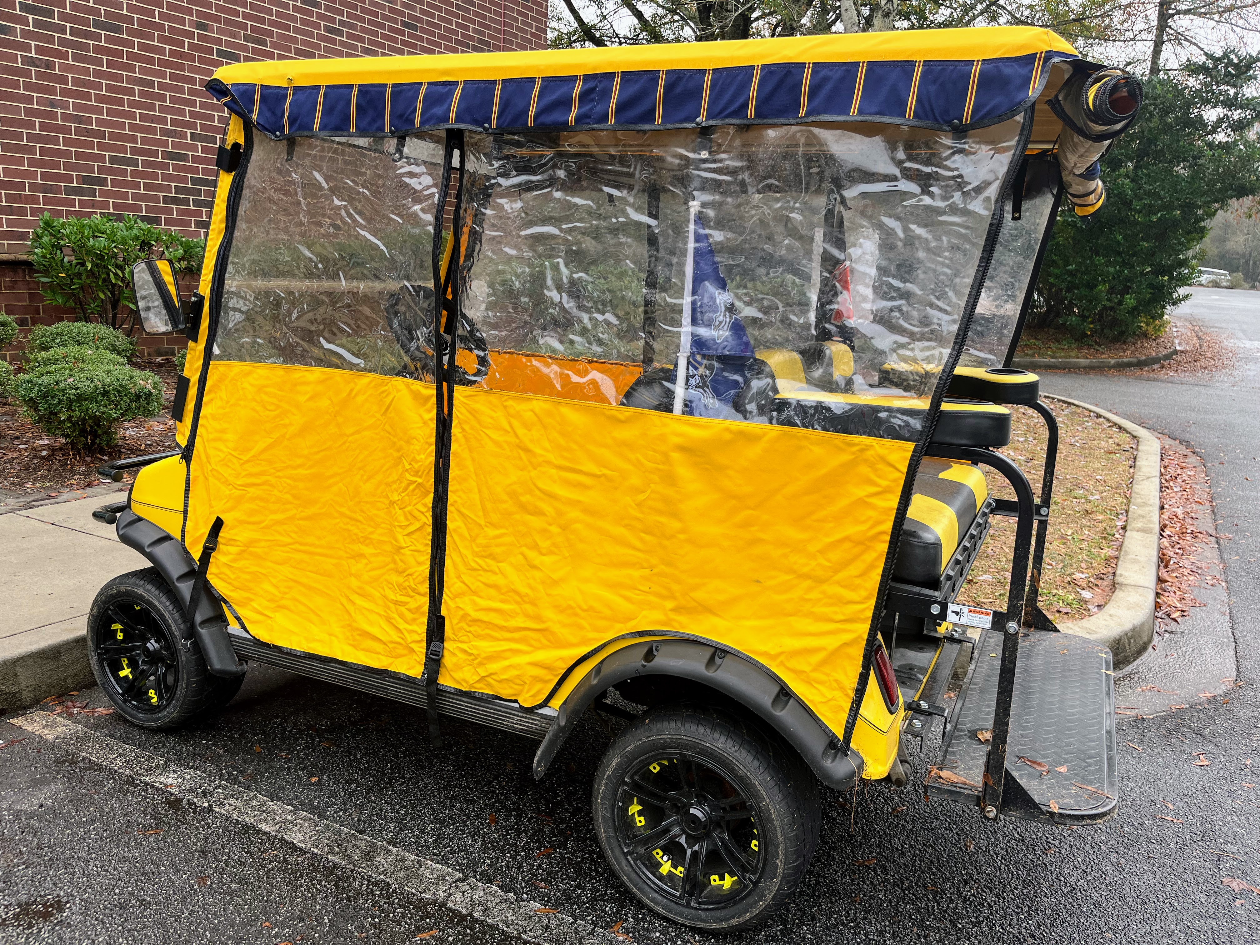 yellow golf cart enclosure