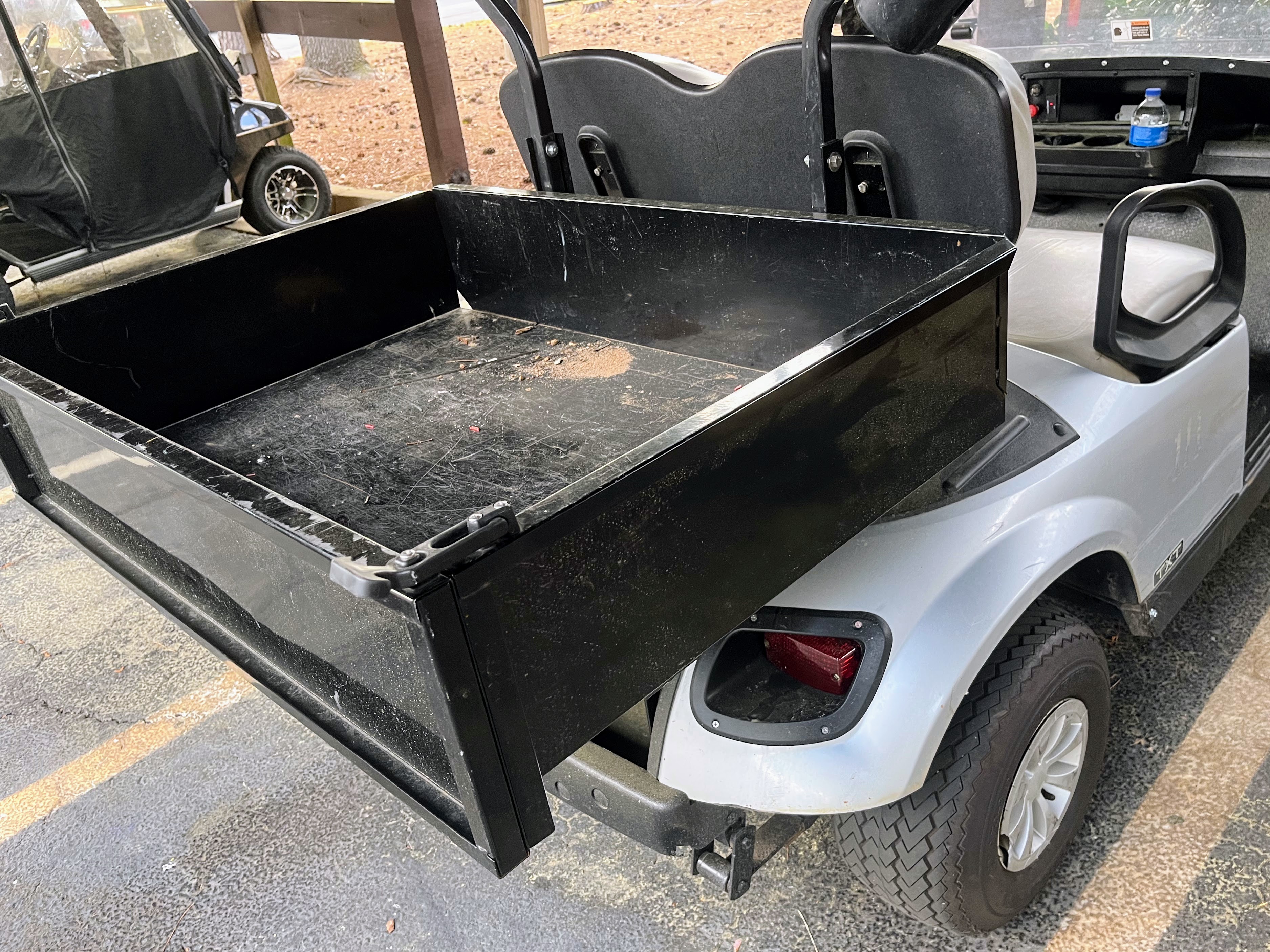 black metal golf cart cargo box