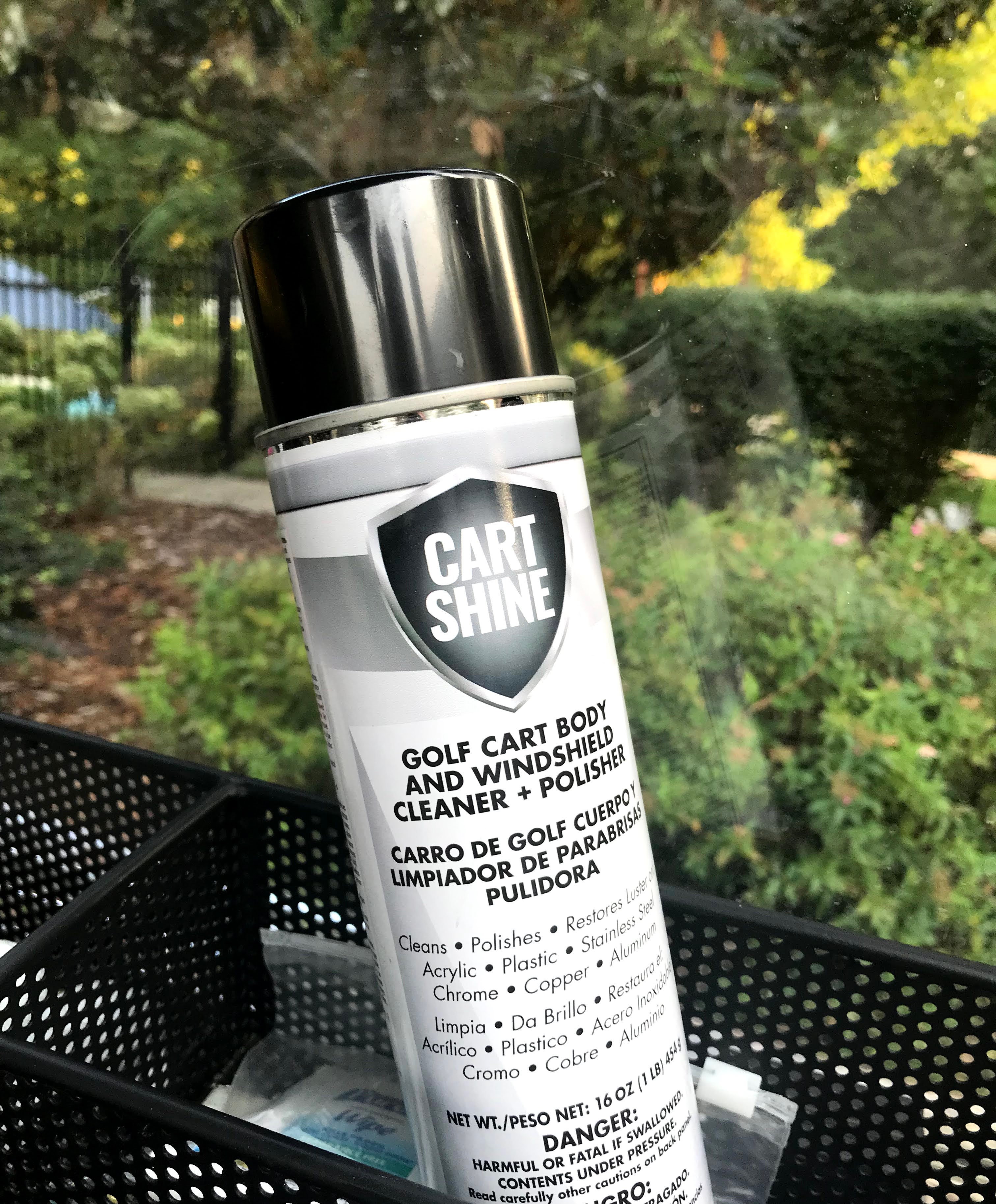 can of Cart Shine golf cart body cleaner and polisher in a golf cart basket