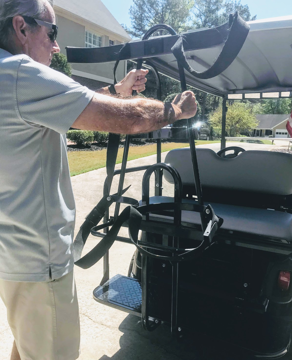golf cart safety bar with golf bag rack