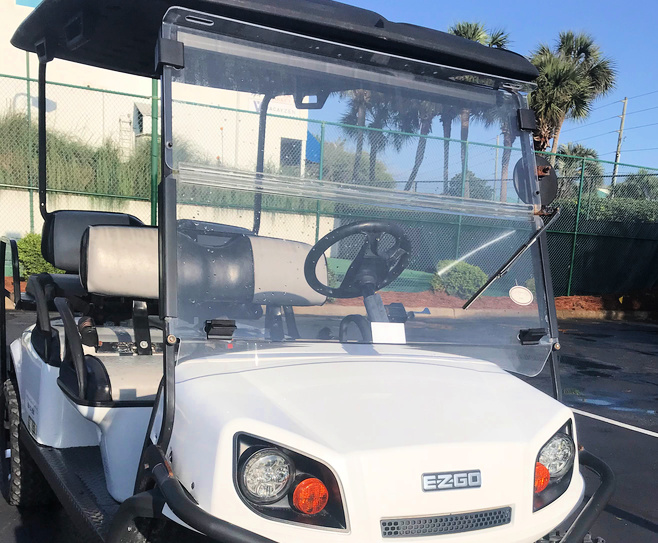 golf cart windshield wiper on white EZ GO golf cart