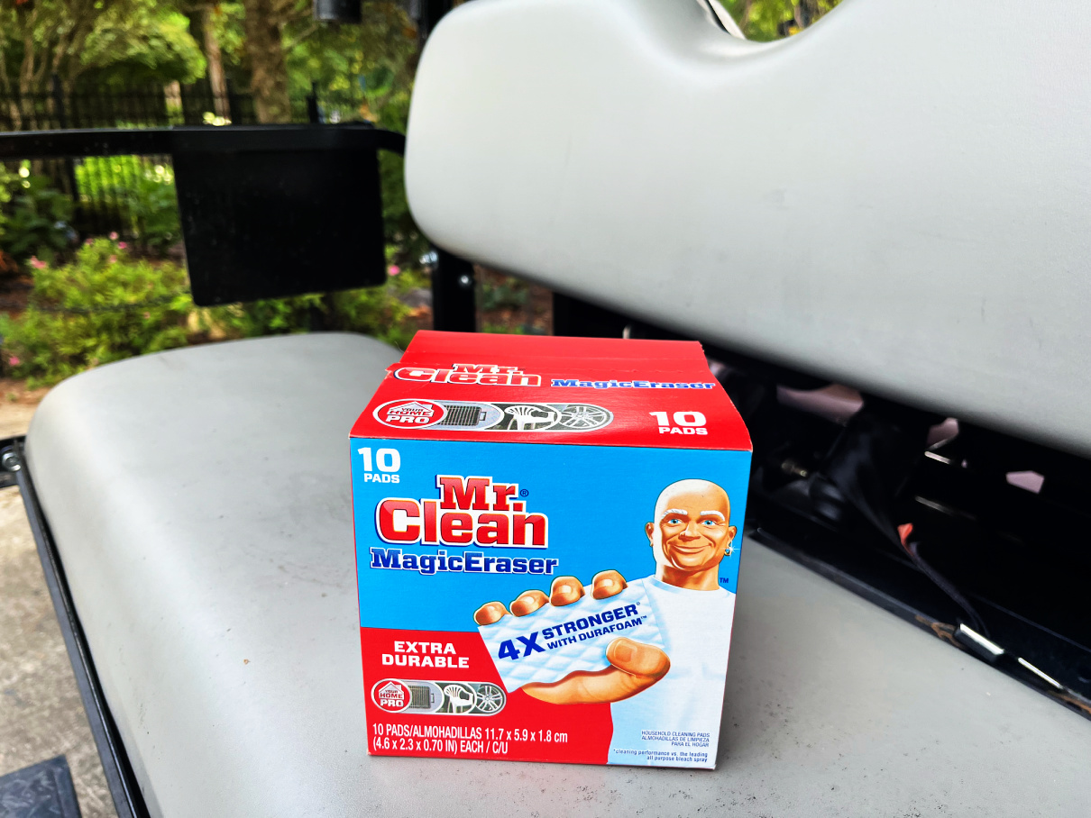 clean golf cart seat with Mr. Clean eraser