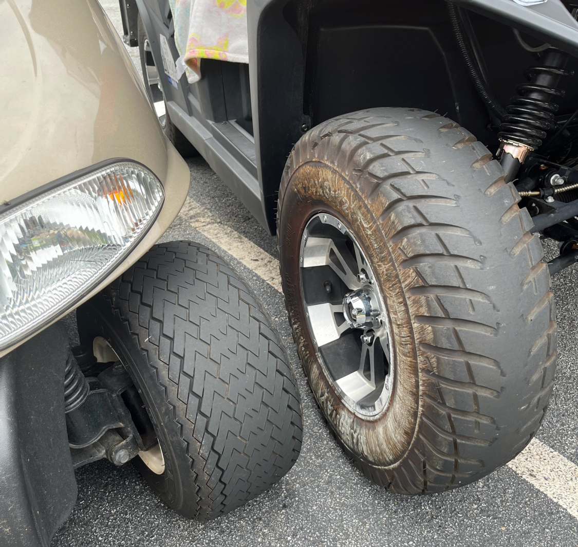 large and standard golf cart tire side by side